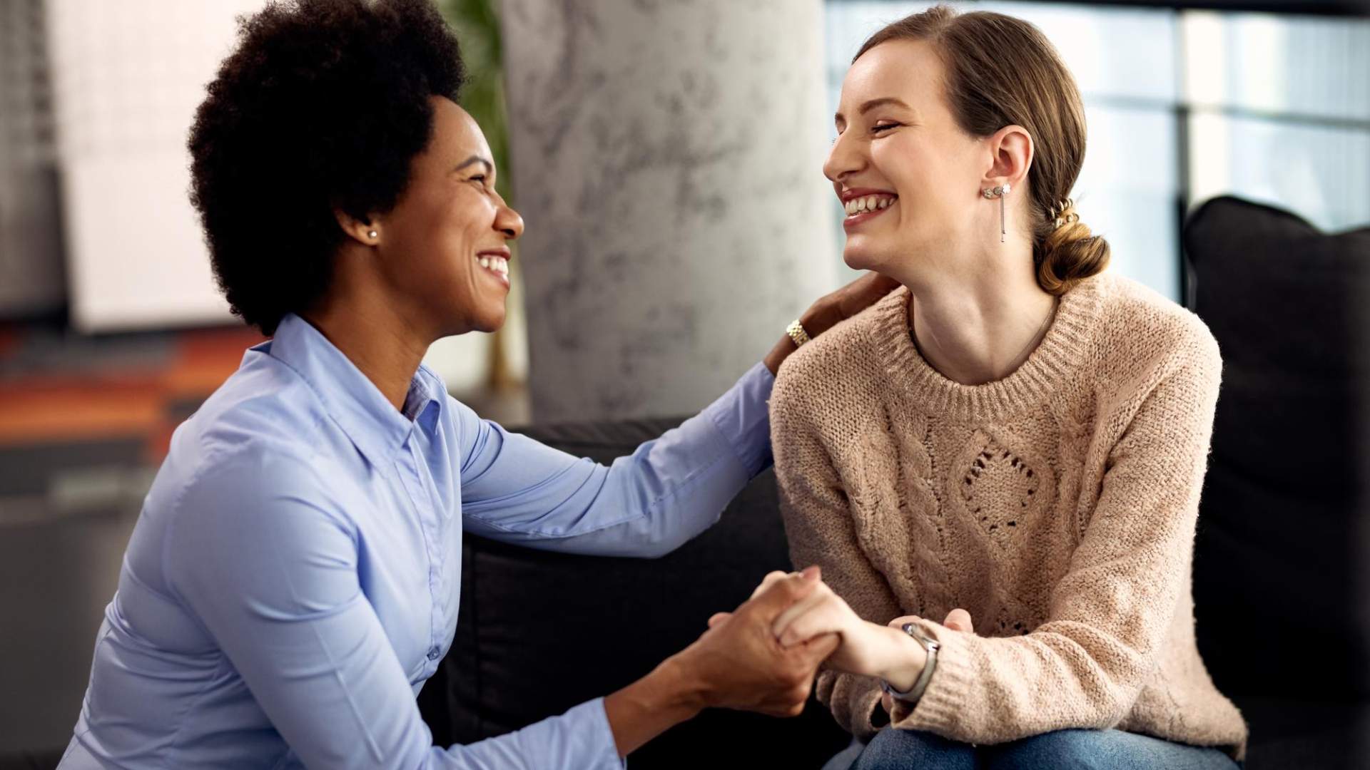 Two women in a supportive setting discussing Ketamine for Anxiety in Centennial