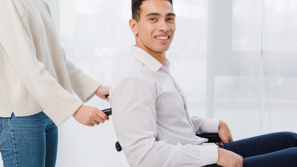 Hopeful man in wheelchair in comfortable treatment room during Ketamine for Chronic Pain for Centennial, CO session