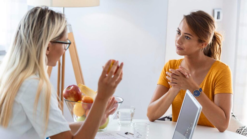 Woman receiving Ketamine for Eating Disorders in Centennial in a supportive clinical setting