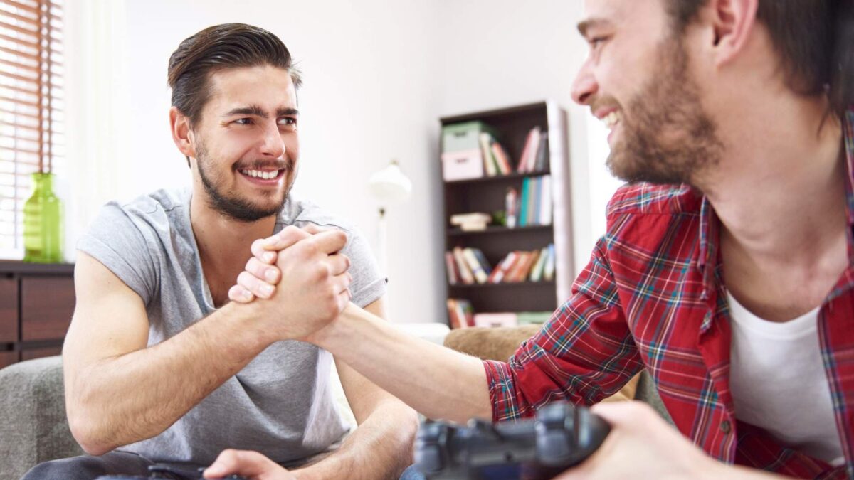 Two men relaxing with a gaming session after Ketamine for Nerve Pain in Centennial, CO therapy