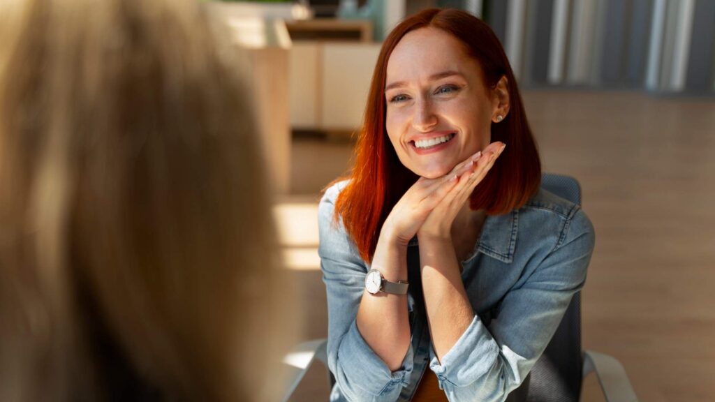 Thoughtful woman in compassionate counseling session for Ketamine for Treatment Resistant Depression in Centennial, CO